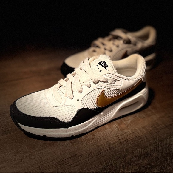 Nike Shoes - Nike White Black Sneakers with Gold Swoosh